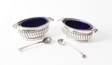 A PAIR OF VICTORIAN SILVER TWIN HANDLED SALTS AND A PAIR OF SILVER SALT SPOONS (4)