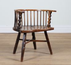 A 19TH CENTURY PRIMITIVE ASH AND ELM LOW COMB BACK CHAIR