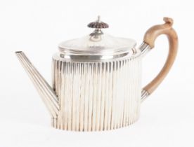 A GEORGE III SILVER TEAPOT