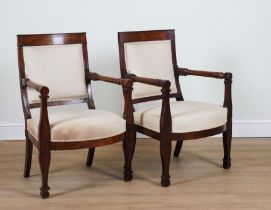 A PAIR OF FRENCH CHARLES X MAHOGANY FRAMED OPEN ARMCHAIRS (2)
