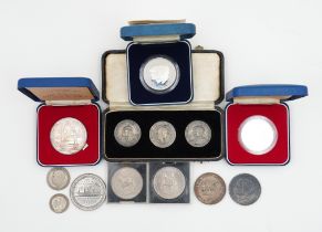 A GROUP OF COINS AND MEDALLIONS (QTY)