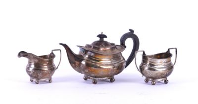 A SILVER THREE PIECE TEA SET