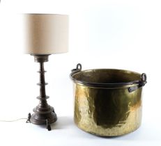 A LARGE BRASS SEAMED CAULDRON OR PRESERVING PAN TOGETHER WITH A FLEMISH OR DUTCH 16TH CENTURY...