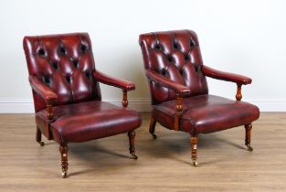 A PAIR OF REGENCY STYLE RED LEATHER UPHOLSTERED OPEN ARMCHAIRS (2)