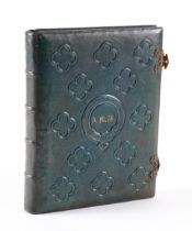 ALBUM - An album on c.18 card leaves containing numerous mounted embossed crests, many...
