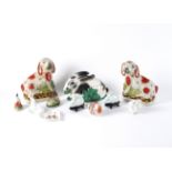 A GROUP OF SMALL CERAMIC FIGURES OF ANIMALS AND BIRDS