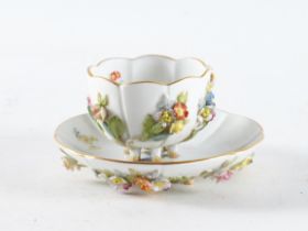 A MEISSEN CUP AND SAUCER (2)