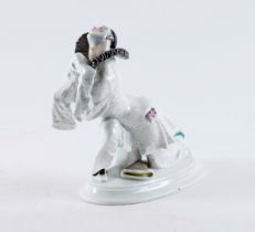 A MEISSEN PORCELAIN FIGURE OF A PIERROT FROM THE BALLET RUSSES