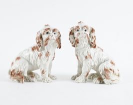 A PAIR OF NYMPHENBURG FIGURES OF BOLOGNESE TERRIERS (2)