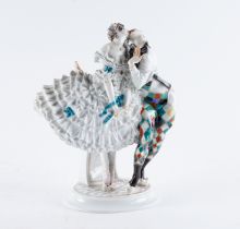 A MEISSEN PORCELAIN FIGURE OF HARLEQUIN AND COLUMBINE