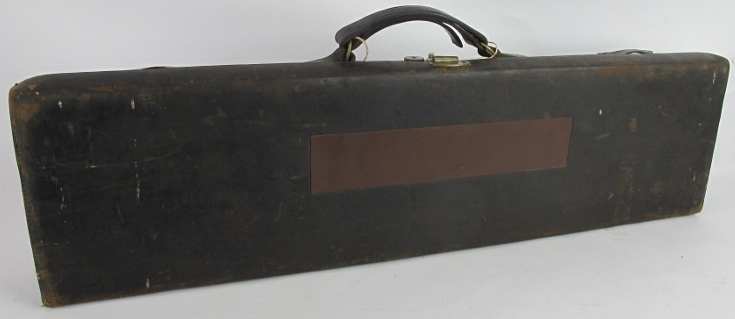 An antique leather shotgun case by James Macnaughton & Sons, Edinburgh. Red felt lining, brass