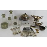 A quantity of mainly silver plated wares including sauce boats, teaspoons, fruit knives, butter