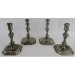 A set of four silver Queen Anne style candlesticks. New hallmarks from Assay Office, London 2022.