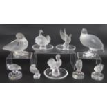 Nine post-1945 Lalique glass bird figures including three pin dishes. All signed Lalique France,