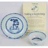 An 18th century Chinese porcelain Nanking Cargo tea bowl and saucer, c1752, with Christie's labels