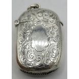 A silver vesta case with engraved decoration and blank Cartonche. Birmingham 1898. 22 grams.