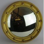 A circular gilt framed convex mirror with bead decoration, diameter: 40cm. Condition report: Some