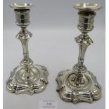 A pair of classical shaped silver candlesticks. Sheffield 1901. Approx: 8". Weighted. Condition