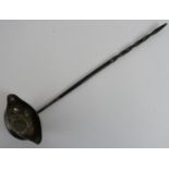 An unmarked toddy ladle with inset Georgian coin on a whale bone handle. Condition report: Some