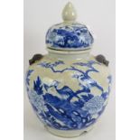 A 19th century Chinese blue and white crackle ware porcelain vase and cover in the Kangxi style