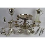 A mixed lot of silver plate including a candelabra, fruit set, hip flasks, trophies, sauce bottle,