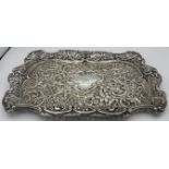 A heavily embossed silver dressing table tray. Birmingham 1903. 9.4 troy oz/295 grams. Condition