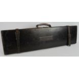 A 1920s/30s leather shotgun case by Charles Lancaster & Co, London. Red felt lined with working