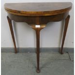 An antique burr walnut crossbanded demi-lune turnover card table, on tapering cabriole supports with