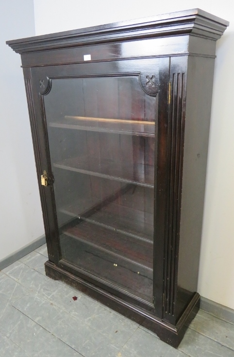 A Victorian mahogany ebonised glazed bookcase, flanked by reeded columns, housing four height - Image 2 of 3
