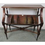 A Regency Revival mahogany book trough, with five divided compartments, on turned tapering