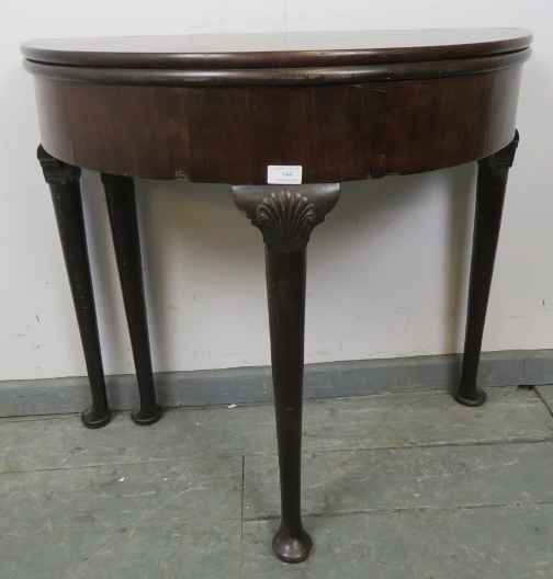 A Georgian Cuban mahogany demi-lune turnover tea table, with shell carved knees, on tapering - Image 3 of 3