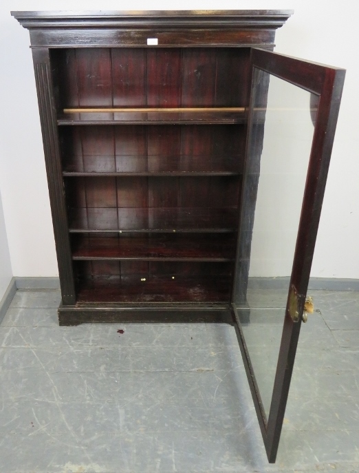 A Victorian mahogany ebonised glazed bookcase, flanked by reeded columns, housing four height - Image 3 of 3