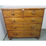 An early Victorian feathered mahogany chest of two short over three long graduated cock-beaded