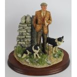 A Border Fine Arts figure 'Next To Go' in the form of a shepherd and sheep dogs. Certificate and
