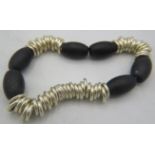 A Links of London black onyx & silver 'sweetie' bracelet, in Links bag & box. Condition report: No