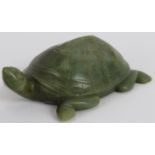 A Chinese carved spinach Jade turtle, Ming style but likely Qing, 10cm long x 4cm high.