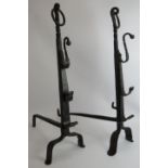 A pair of large French antique wrought iron fire andirons in the 16th/17th century style. Overall