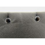 A pair of black diamond & 14ct white gold ear studs, stamped '585', clarity believed to be VVS1,