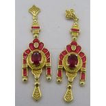 Faceted Ruby solitaire with decorative enamel inlay earrings. 50mm drop approx. Post back. 14k