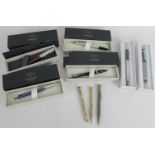 A Parker Urban fountain pen, three Parker ball point pens. a Nina Ricci fountain pen, Nina Ricci