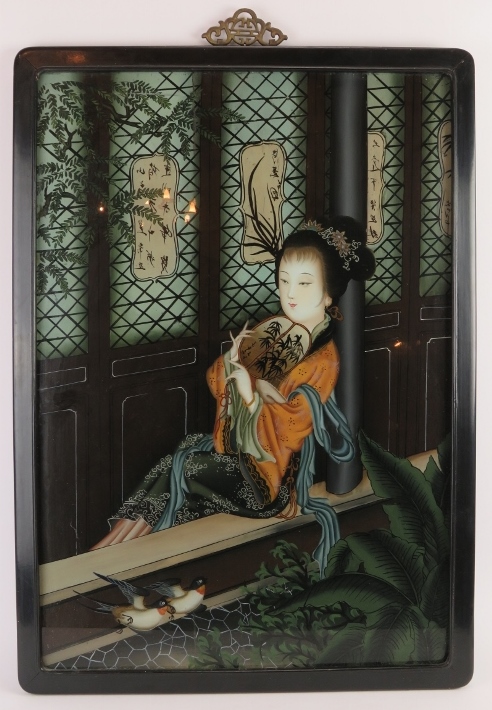 A vintage Chinese reverse painted glass panel depicting a lady sitting in a window. Black lacquer