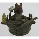 A Vienna Bergmann style cold painted bronze figure of a fox in a barrel bath tub. Mark to tear of