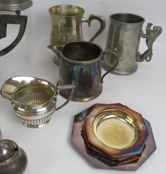 A lot of mixed pewter and silver plated wares including seven pint tankards, pin dishes, three piece - Image 3 of 4