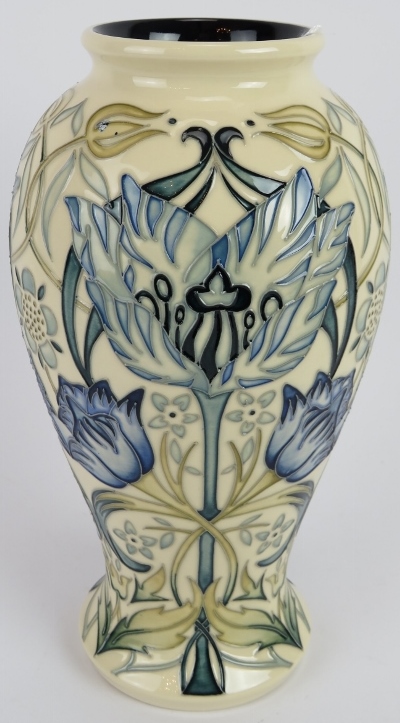 A Moorcroft pottery blue tulip vase William Morris tribute pattern by Nicola Slaney, c2013. Height