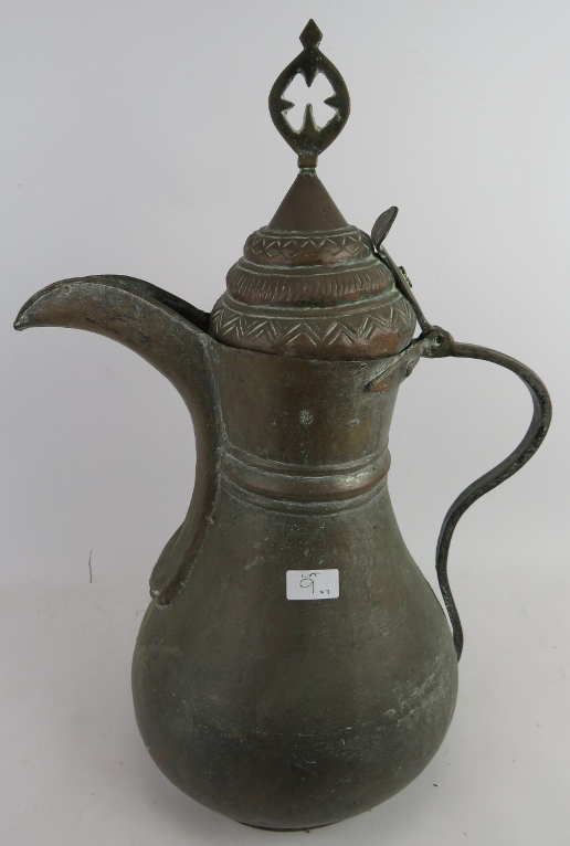 Two large beaten copper Middle Eastern water ewers and a large dallah coffee pot with detachable li - Image 5 of 5