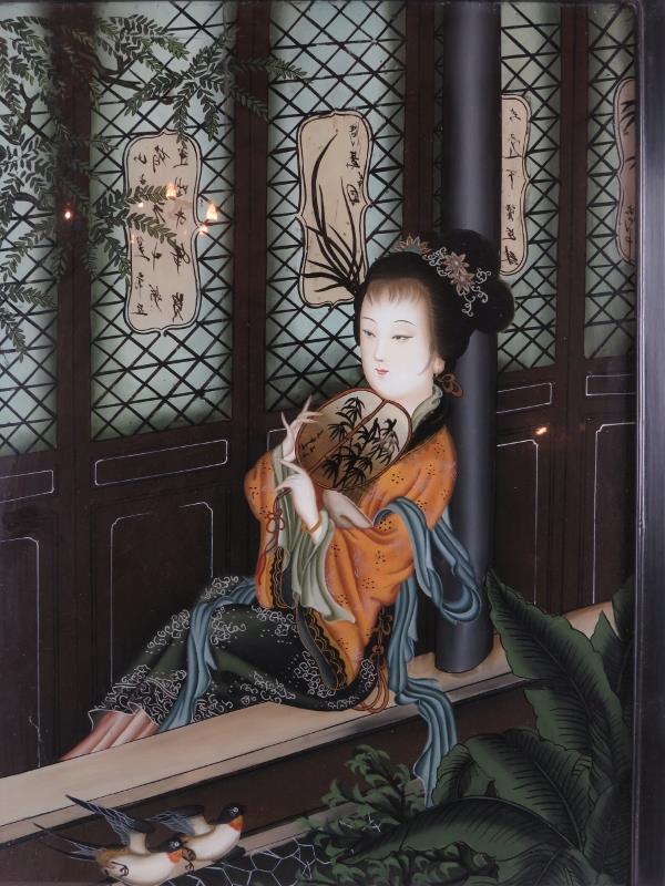 A vintage Chinese reverse painted glass panel depicting a lady sitting in a window. Black lacquer - Image 2 of 4