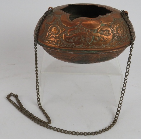 A small Middle Eastern copper Kashkul begging bowl with ornate chased decoration and chain handle. - Image 2 of 4