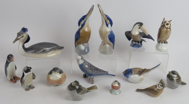 Ten Royal Copenhagen porcelain figures of birds including kingfishers, grebe, penguin, robins and