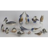 Ten Royal Copenhagen porcelain figures of birds including kingfishers, grebe, penguin, robins and