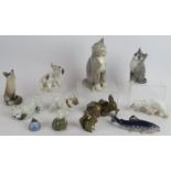 12 Danish porcelain figures by Royal Copenhagen and B & G, including cats, fish, polar bear,